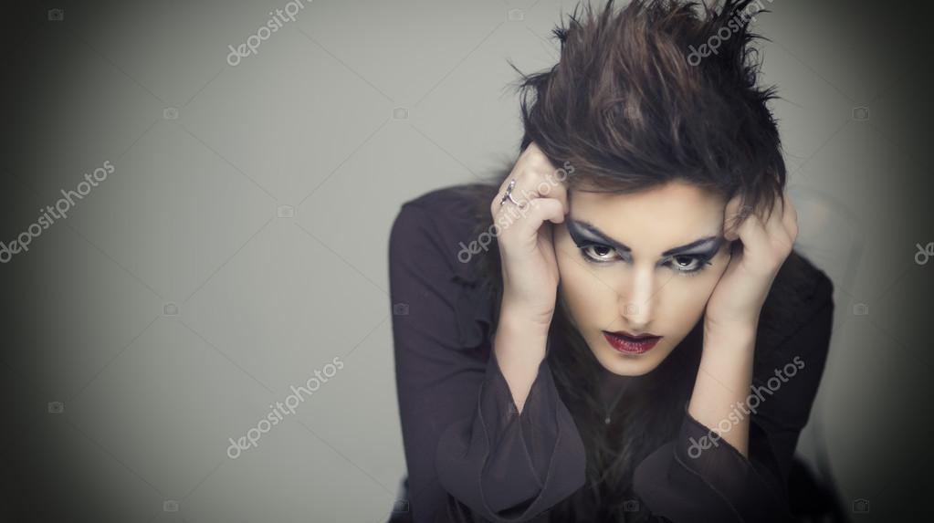 Portrait of woman with intense expression Stock Photo by ©AVFC 23367474