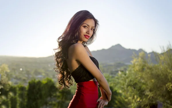 Beautiful exotic woman with gorgeous long hair — Stock Photo, Image