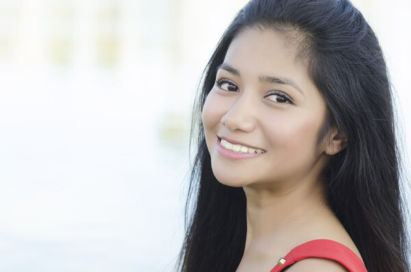 Beautiful smiling young Asian American woman