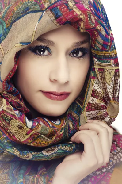 Beautiful young woman wearing head scarf — Stock Photo, Image