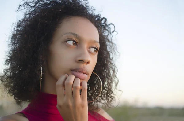 Portrait of young woman thinking — Stock Photo, Image