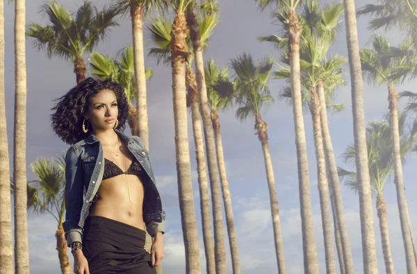 Beautiful young woman wearing bikini and denim jacket — Stock Photo, Image