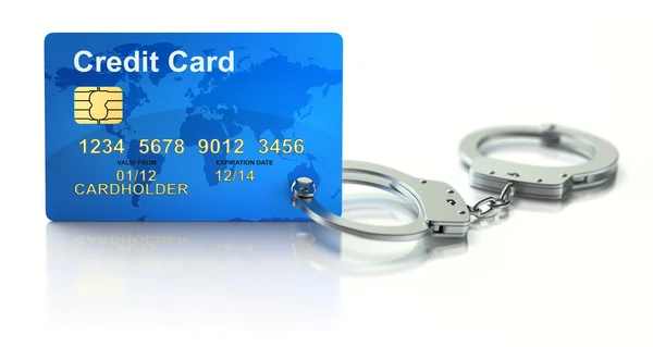 Creditcard met handboeien — Stockfoto