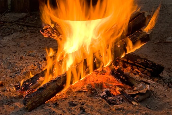 Touristic cauldron on a fire — Stock Photo, Image