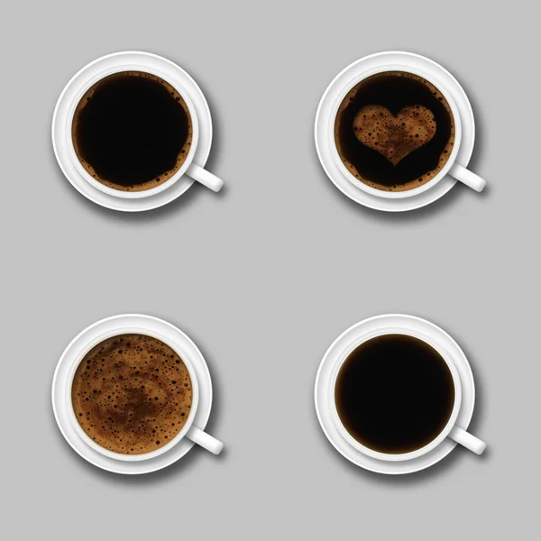 Quatre tasse de café sur un fond gris — Photo