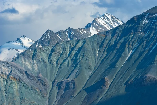 Varicoloured mountain vägg — Stockfoto