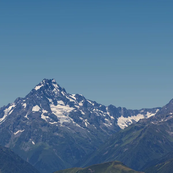 Mount top on a blue sky background — Stock Photo, Image