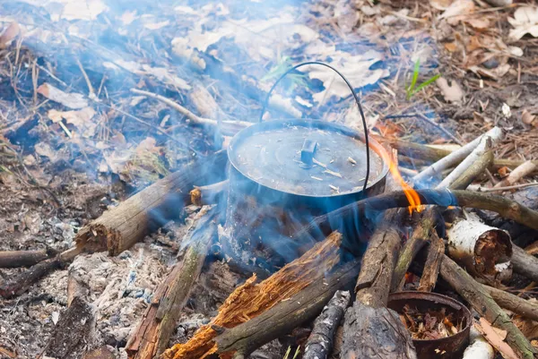 touristic caldron in a fire