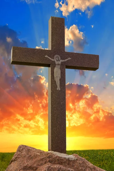 Christian cross on a sunset background — Stock Photo, Image