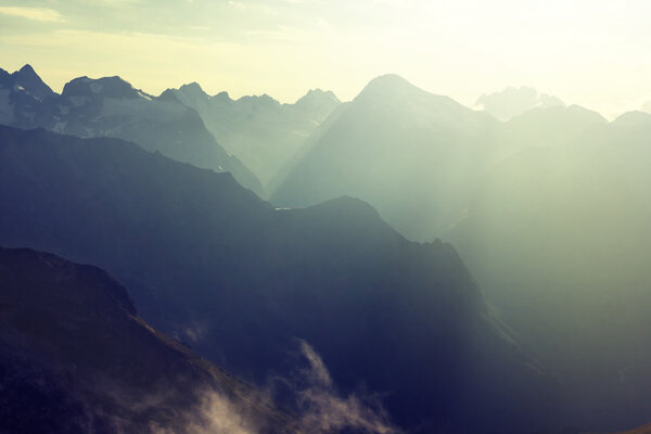 Mountain chains in a rays of sun