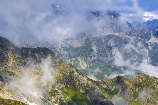 Mountains in a clouds — Stock Photo, Image