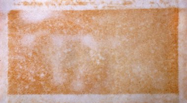 old yellowed sheet of paper texture background.
