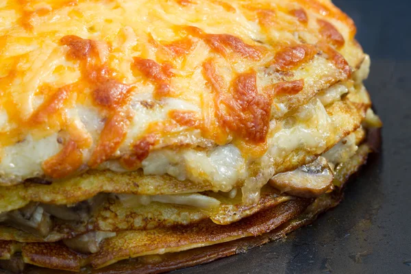 Pancake pie with mushrooms — Stock Photo, Image