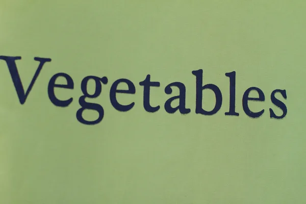 Grönsaker skriven på duk — Stockfoto