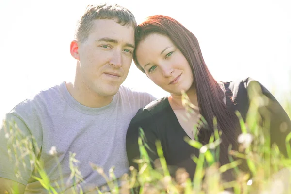 Young newleywed couple in bright sun — Stock Photo, Image