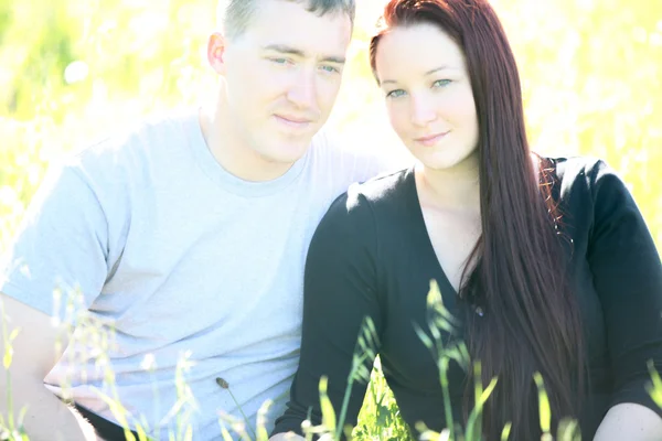 Young newleywed couple in bright sun — Stock Photo, Image