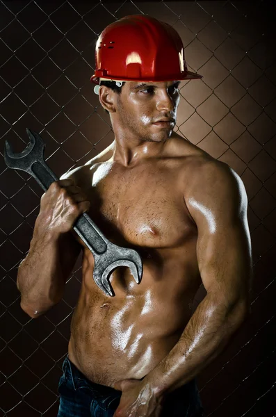 Workman big wrench — Stock Photo, Image