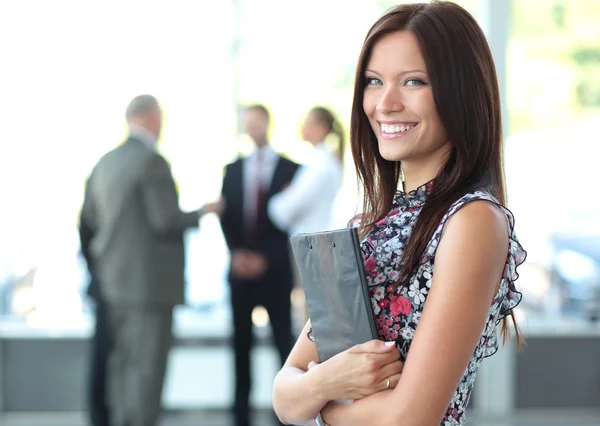 Beautiful woman on the background of business Royalty Free Stock Images