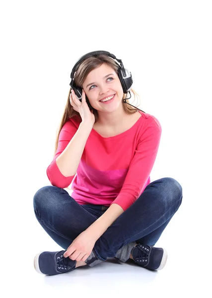 Woman with headphones listening music on player Stock Photo