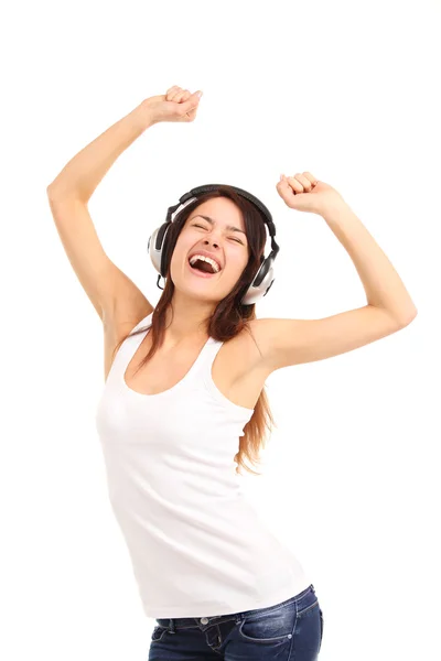 Mujer con auriculares escuchando música en el reproductor. Música adolescente chica . — Foto de Stock