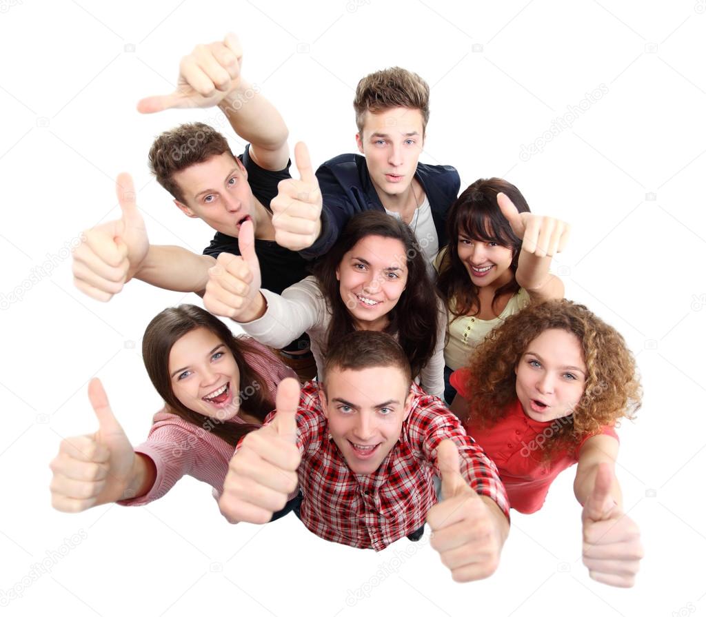 Group of happy joyful friends standing with hands up isolated on white background