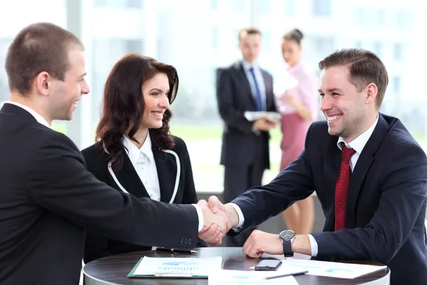 Business shaking hands, finishing up a meeting Stock Photo