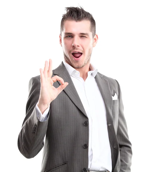 Happy smiling young business man with thumbs up gesture — Stock Photo, Image