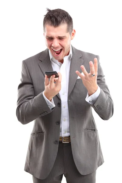 Angry business man screaming on cell mobile phone, portrait of young handsome businessman isolated over white background, concept of executive yelling, conversation problem communication crisis Stock Picture
