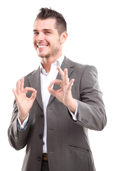 Feliz joven hombre de negocios sonriente con los pulgares hacia arriba gesto —  Fotos de Stock