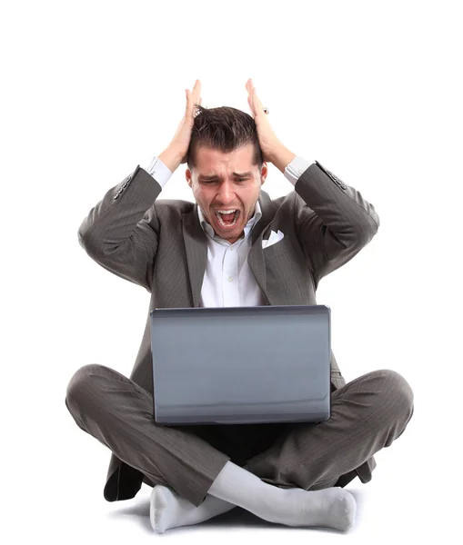 Homem gritando para laptop — Fotografia de Stock