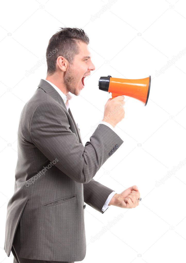 Young man shouting through megaphone