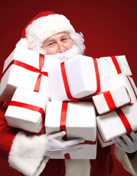 Kerstman met giftboxes — Stockfoto