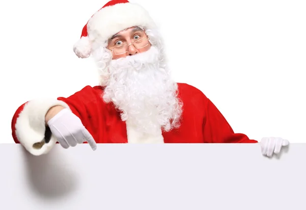 Babbo Natale indicando nel segno bianco vuoto — Foto Stock