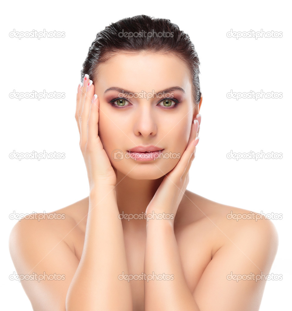 Beautiful Girl Touching Her Face. Isolated on a White Background. Perfect Skin. Beauty Face. Professional Makeup
