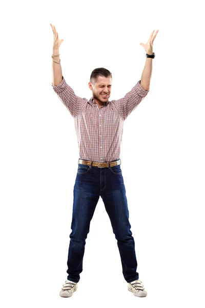 Jovem feliz celebrando o sucesso no fundo branco — Fotografia de Stock