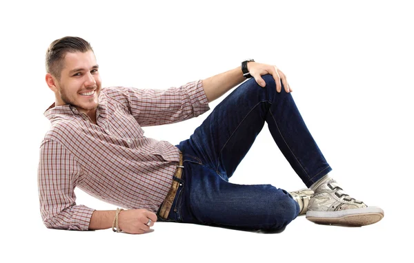 Flirtatious man sitting on the floor — Stock Photo, Image