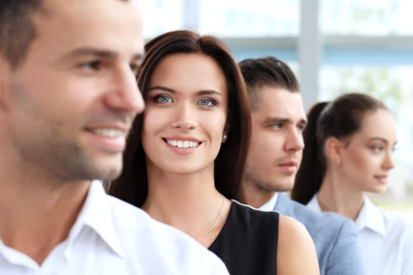 Mulher com grupo empresarial — Fotografia de Stock