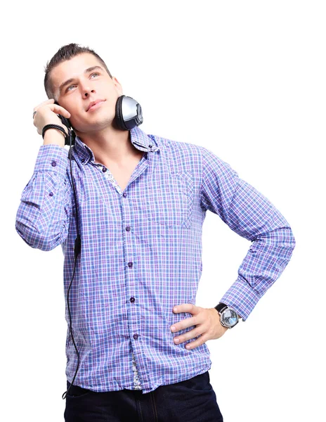 Fülhallgatót viselő fiatalember — Stock Fotó