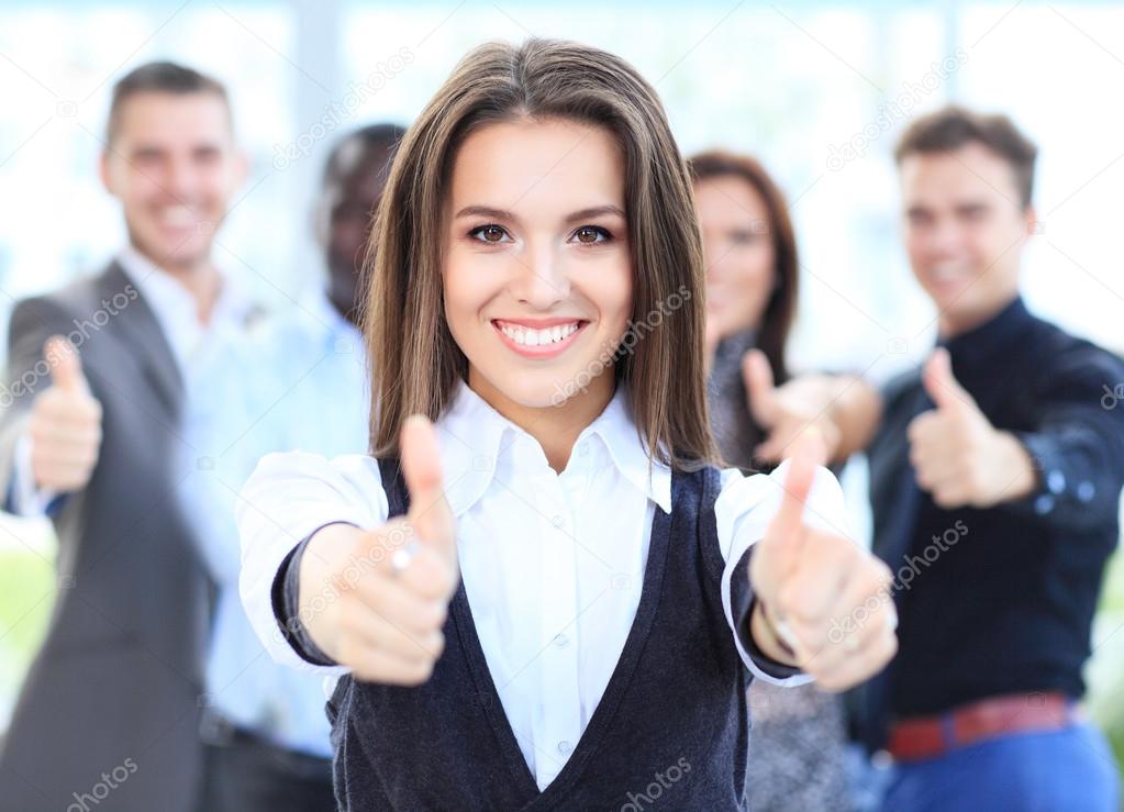 Businesswoman showing thumbs up