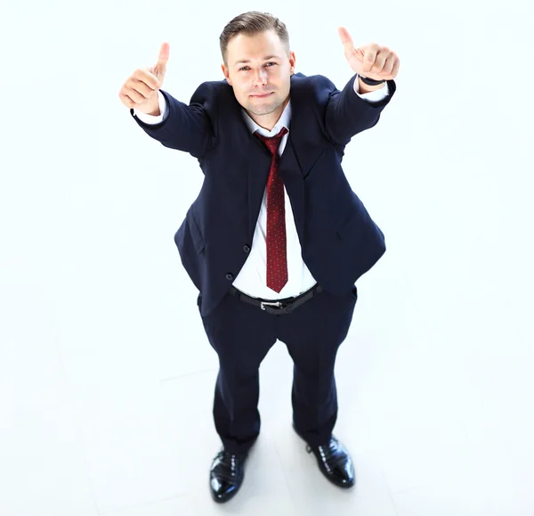 Businessman with thumbs up gesture — Stock Photo, Image