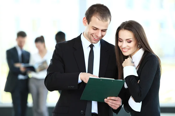 Business partners discussing documents — Stock Photo, Image