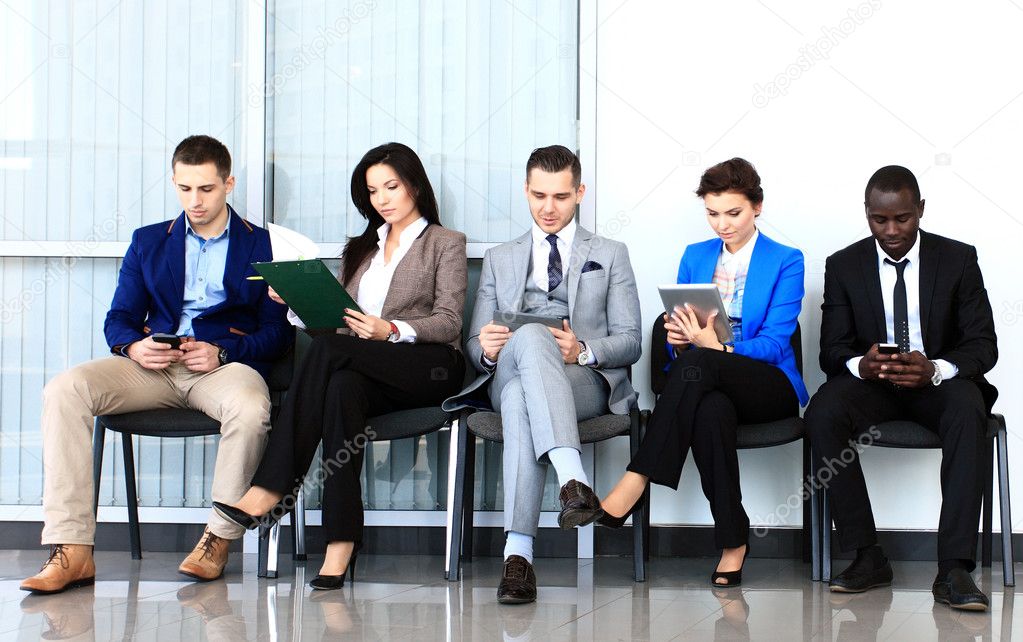 Businesspeople waiting for job interview