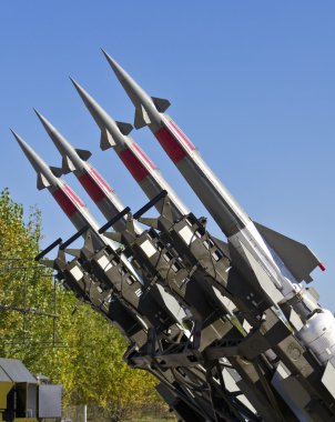 Four rockets of a surface-to-air missile system clipart