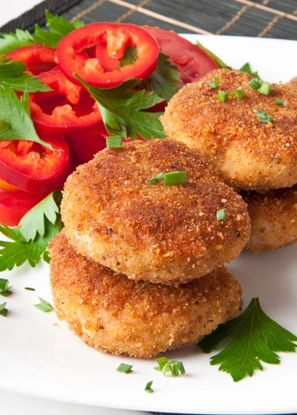 Chicken cutlets with vegetables and herbs — Stock Photo, Image