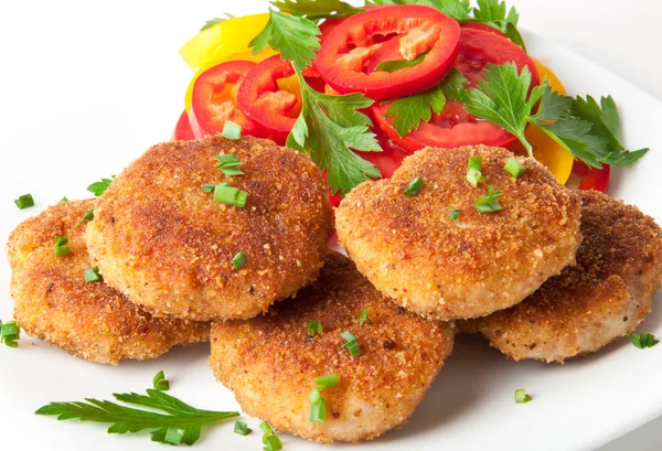 Chicken cutlets with vegetables and herbs — Stock Photo, Image