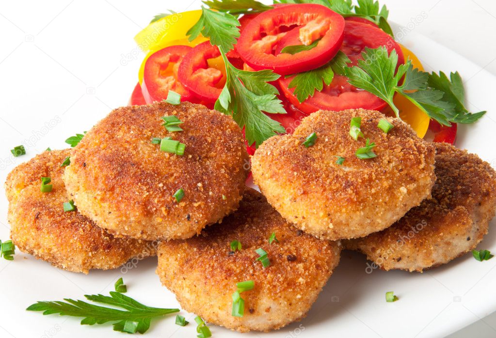 Chicken cutlets with vegetables and herbs