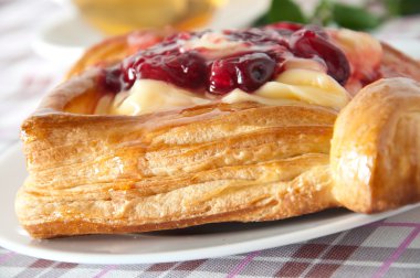 Delicious Cherry puff pastry with custard clipart