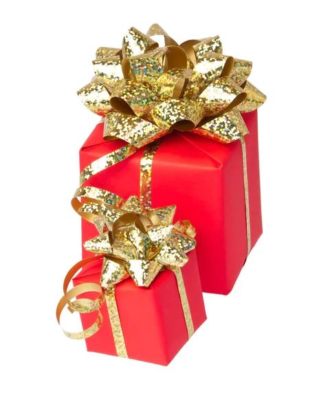 Two gifts wrapped with golden bow, white background — Stock Photo, Image