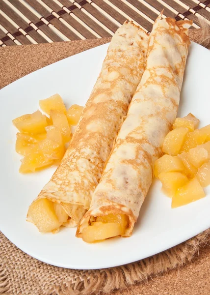 Sweet crepes with apple caramel and cream — Stock Photo, Image