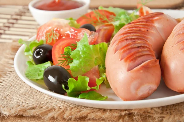 Sausages on the grill — Stock Photo, Image